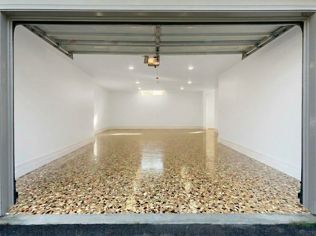 After — cream and brown flake epoxy garage floor with high-gloss finish by ColourX